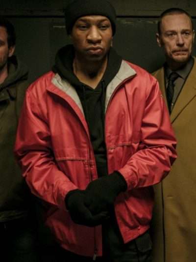 Captive State Jonathan Majors Red Jacket