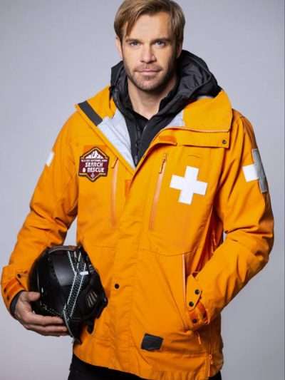 Stephen Huszar Love in Glacier National 2023 Orange Jacket