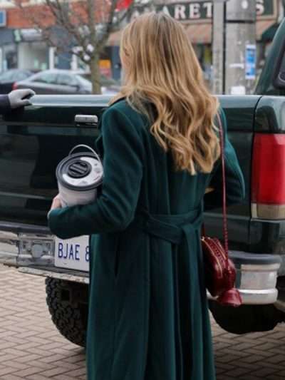 Ashley Newbrough Flipping for Christmas 2023 Green Trench Coat
