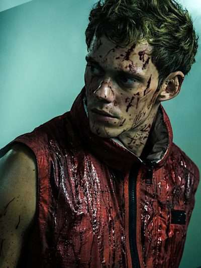 Bill Skarsgård Boy Kills World 2024 Red Vest