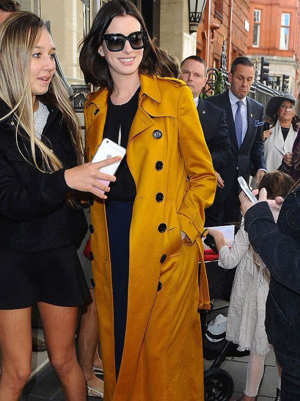 London Street Style Anne Hathaway Mustard Trench Coat