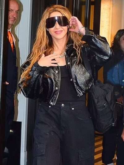 Inspired by: Shakira External Material: Real Leather Inner Lining: Viscose Lining Front: Zipper and Buttoned Closure Collar: Stand-Up Collar Color: Black Pockets: Two at Front and One Inside Sleeves: Full-length Sleeves