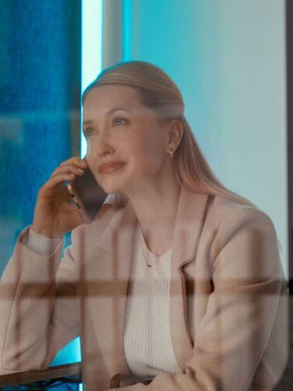 Christmas Above the Clouds 2025 Emily Tennant Beige Wool Coat